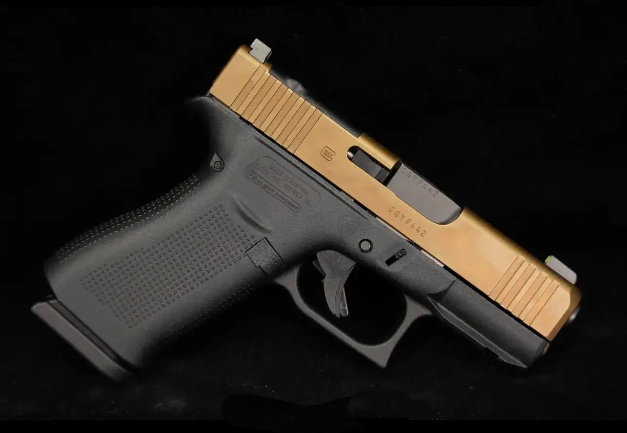 Glock 43X with gold slide