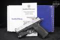 Smith & Wesson (S&W) SD9 2.0 With Crimson Trace CMR-209 9mm Luger Two-Tone Silver & Black in Excellent Condition Image 2