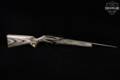 Remington Model 597 Magnum LS .17 HMR Blued & Gray Laminate in Good Condition Image 3