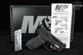 Smith & Wesson (S&W) M&P9 Shield M2.0, Thumb Safety, Integrated Crimson Trace Red Laser 9mm Luger Black in Excellent Condition Image 2