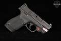 Smith & Wesson (S&W) M&P 9 Shield M2.0; Integrated Crimson Trace Red Laser; No Thumb Safety 9mm Luger Black in Very Good Condition Image 4