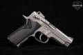 Smith & Wesson (S&W) Model 4006 .40 S&W Stainless Steel in Good Condition Image 3
