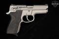 Smith & Wesson (S&W) Model 6906 Third Generation 9mm Luger Two-Tone Stainless in Good Condition Image 4