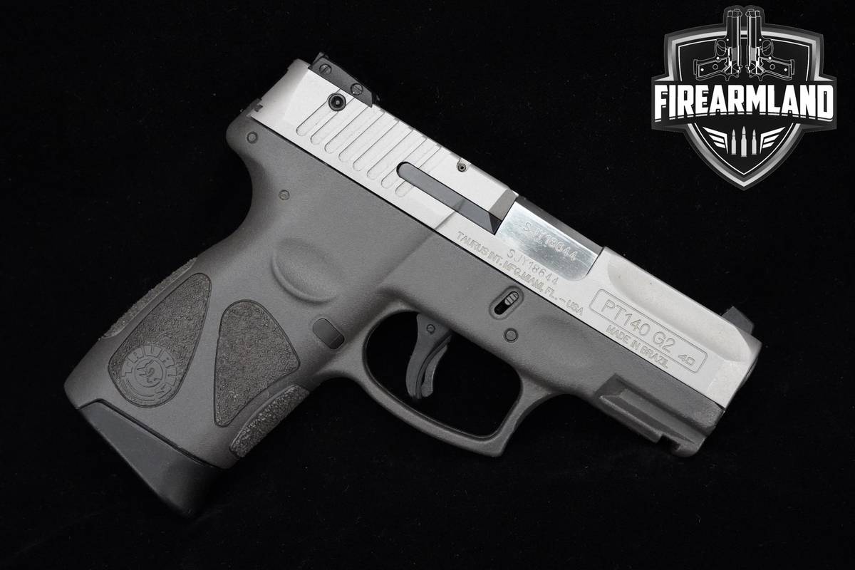 Taurus PT140 G2 Millennium G2 40 S&W 3.2" Two-Tone Taurus +2 MAGS