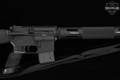 2006-2011 Bushmaster XM15-E2S Stainless Varmint Special 5.56mm NATO Stainless & Black in Very Good Condition Image 5