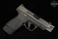 Smith & Wesson (S&W) M&P9 Shield Plus Performance Center Carry Comp 9mm Luger Two-Tone Gray in Very Good Condition Image 3