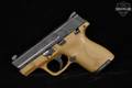 Smith & Wesson (S&W) M&P9 Shield Gen 1, Thumb Safety 9mm Luger Two-Tone Black & Tan in Very Good Condition Image 2