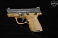 Smith & Wesson (S&W) M&P9 Shield Gen 1, Thumb Safety 9mm Luger Two-Tone Black & Tan in Very Good Condition Image 4