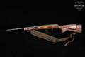 Savage Arms Model 93R17 BRJ (V-Spiral) .17 HMR Blued & Multi-Color Laminate in Very Good Condition Image 2