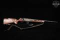 Savage Arms Model 93R17 BRJ (V-Spiral) .17 HMR Blued & Multi-Color Laminate in Very Good Condition Image 3