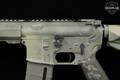 Bushmaster XM15-E2S 5.56mm NATO Camo Spray Paint in Very Good Condition Image 5