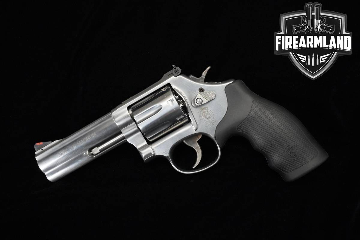 Smith & Wesson (S&W) 686-6 Plus 357 Magnum 4" Stainless Steel S&W ORIG CASE