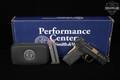 Smith & Wesson (S&W) M&P9 Shield EZ Performance Center, Gold TiN Ported Barrel, Thumb Safety 9mm Luger Black in Very Good Condition Image 2