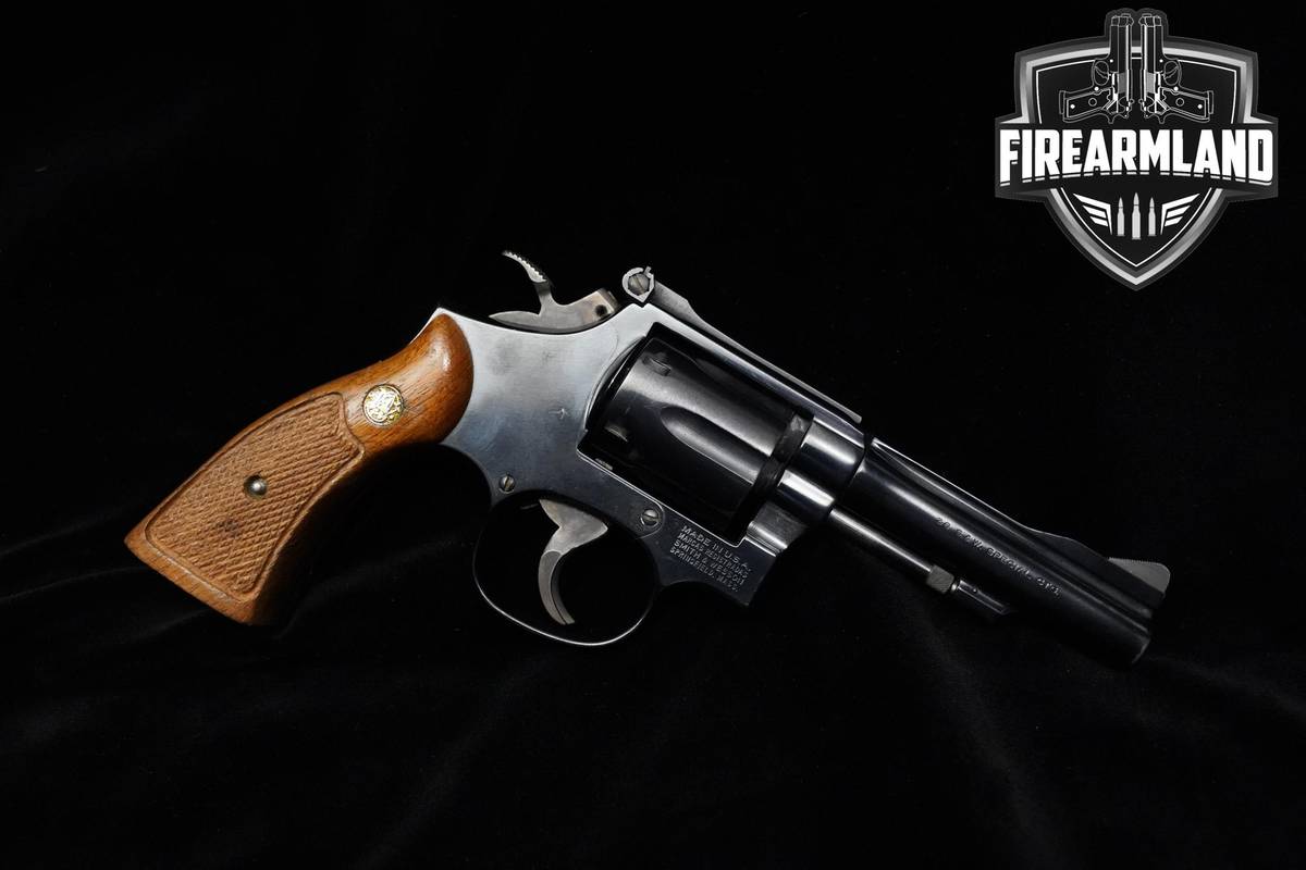 1980 Smith & Wesson (S&W) 15-4 4" Blued S&W 15-4 DA/SA Combat Masterpiece