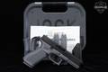 Glock G17 Gen5, Front Serrations (FS), Non-MOS 9mm Luger Two-Tone Black & Gray in Excellent Condition Image 2
